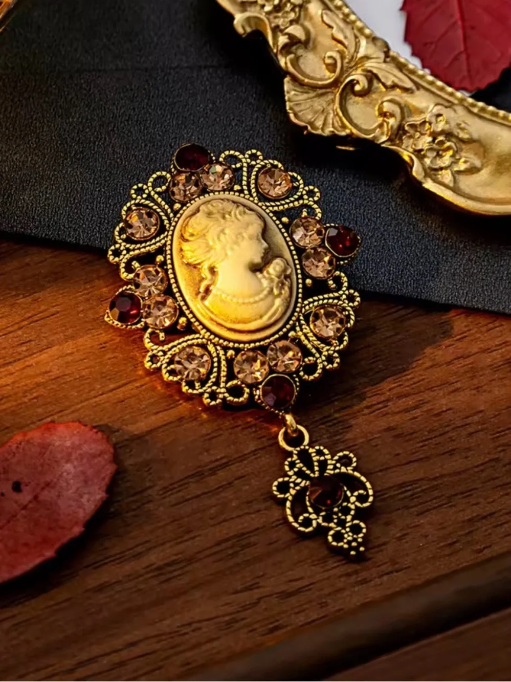 Anthropologie Gold Cameo Brooch with Ivory Cameo and Garnet Accents